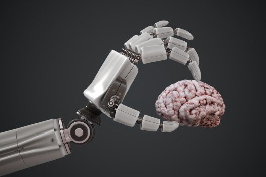 p0005749.m05407.artificial_intelligence_concept_robotic_hand_is_holding_human_brain_3d_rendere...jpg